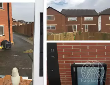 The harsh reality of living in a new building: Endless rows of similar gardens with fences...