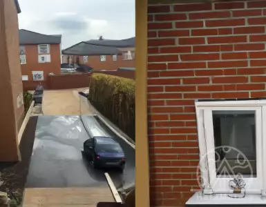 The grim truth on a new construction complex: A never ending row of identical fenced backyards.