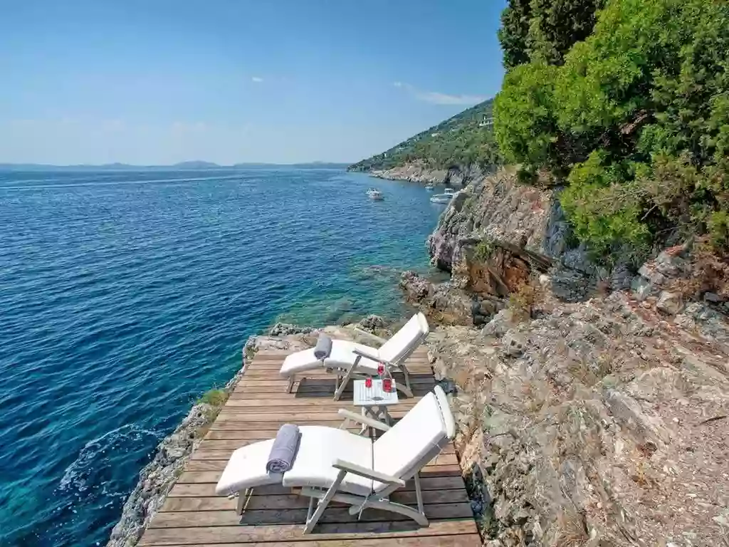 The unrivaled beauty of Corfu: three villas with access to Agni beach