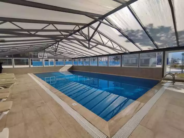 Flat 77m² in Turkey, Payallar. Priced at 128000€ rent photo-23